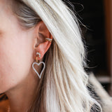 Boucles d'oreilles Love scintillantes en rose